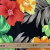 Lycra - Taupe Tropical Leaves and Red Flowers on Black